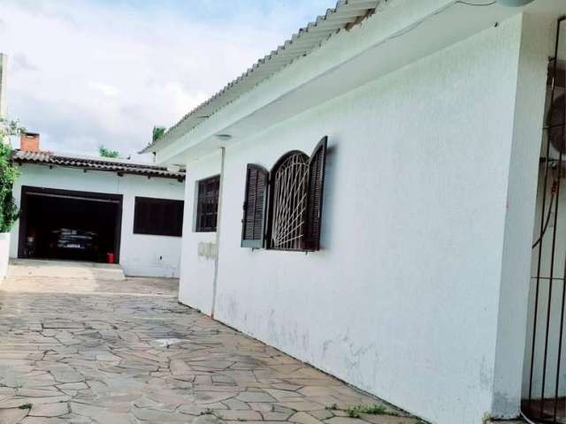 Casa com 4 quartos à venda no Passo das Pedras, Porto Alegre  por R$ 439.900