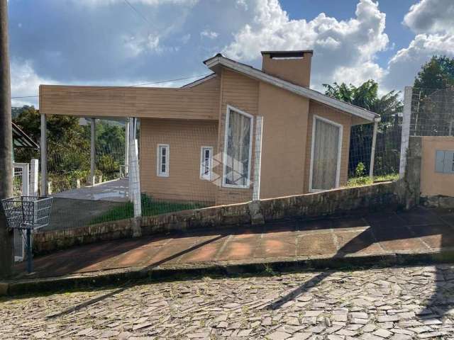 Casa com 3 dormitórios  localizada em área central