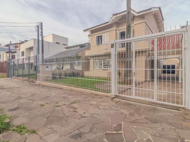 Casa com 3 quartos à venda na Rua Luzitana, 842, Higienópolis, Porto Alegre por R$ 1.350.000