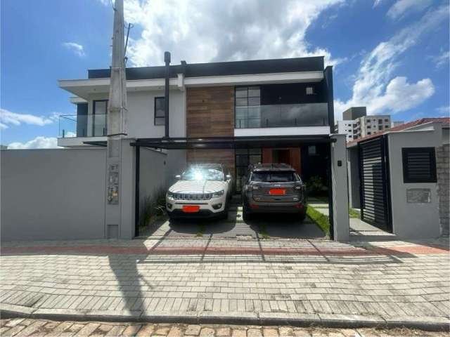 Sobrado com 1 suíte + 2  dormitórios à venda, 106 m² por R$ 729.000 - Bom Retiro - Joinville/SC