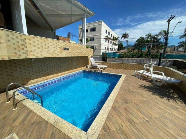 Casa em condomínio na Praia do Morro com 3 quartos, área de churrasqueira e piscina.