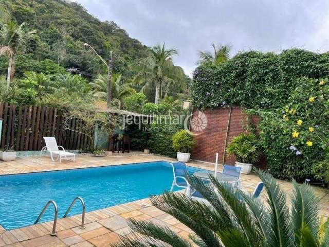 Casa em condomínio fechado com 4 quartos à venda no Balneário Praia do Pernambuco, Guarujá  por R$ 1.400.000