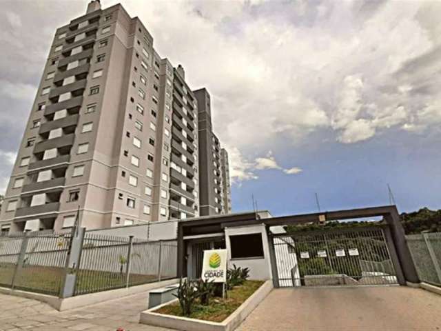 Excelente apartamento no Bairro Santa Catarina! Com 02 dormitórios, sala para 02 ambientes, sacada, cozinha, churrasqueira, área de serviço, banheiro social e 01 vaga de garagem.  Edifício com elevado