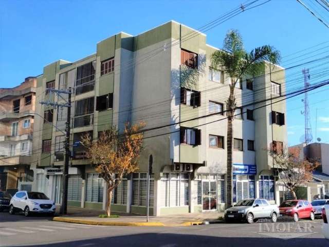 Apartamento no centro com 2 dormitórios, sala, cozinha, banheiro, área de serviço, sacada e garagem.  Área privativa de 73,21 metros.  Confira!