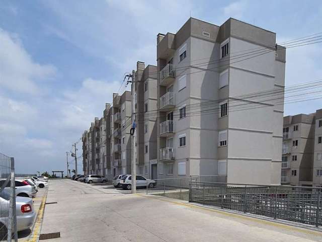 Apartamento com dois dormitórios, sala com  sacada  e churrasqueira, área de serviço,  banheiro e uma vaga de estacionamento descoberta.  Condomínio cercado com portaria, aproveitamento da água da chu