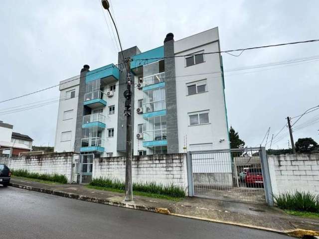 Ótimo apartamento à venda no bairro São Francisco, em Farroupilha/RS. Com 2 dormitórios, sala e cozinha em conceito aberto, sacada fechada com churrasqueira, banheiro social e vaga de estacionamento c