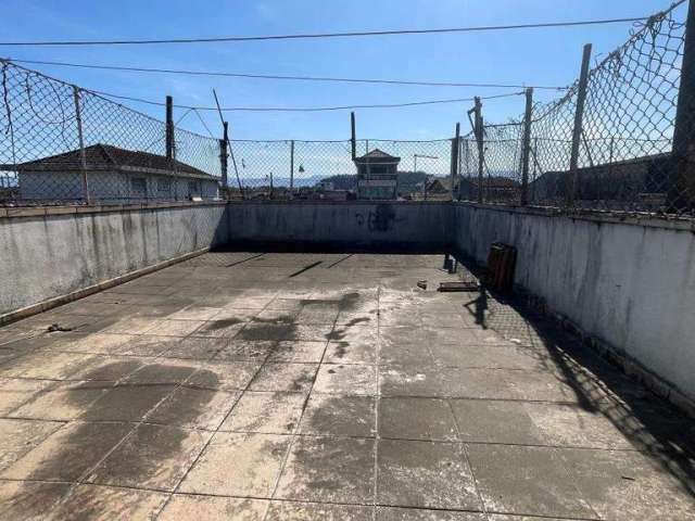 Edifício comercial e residencial com dois dormitórios e uma vaga de garagem