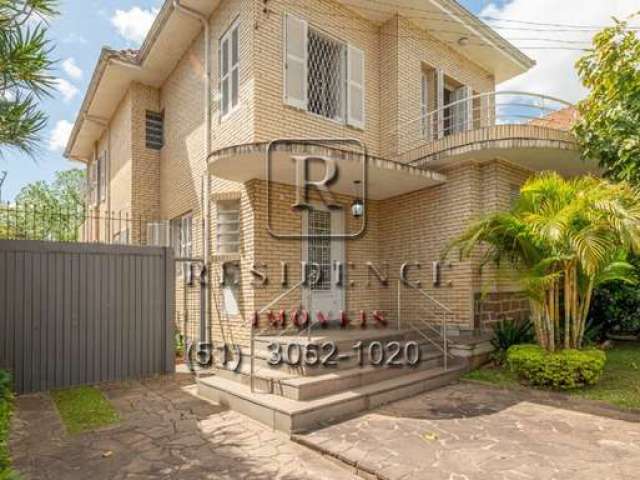 Casa com 3 quartos à venda na Rua General Gomes Carneiro, 258, Medianeira, Porto Alegre, 1100 m2 por R$ 990.000