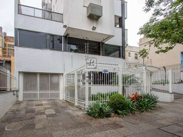 Apartamento de 2 quartos na Auxiliadora: 75m², 1 suíte, 2 salas, 1 banheiro e vaga de garagem. Aluguel em Porto Alegre-RS.