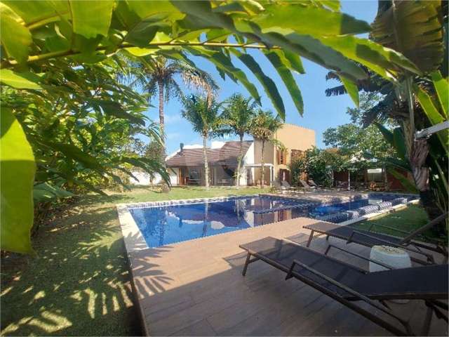 Linda casa á venda com 5 suítes, 4 vagas- Jardim Acapulco - Guarujá