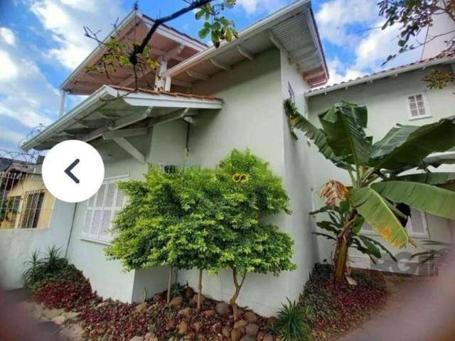 Casa com 4 dormitórios para alugar, 210 m² por R$ 6.000/mês - Jardim Itu Sabará - Porto Alegre/RS