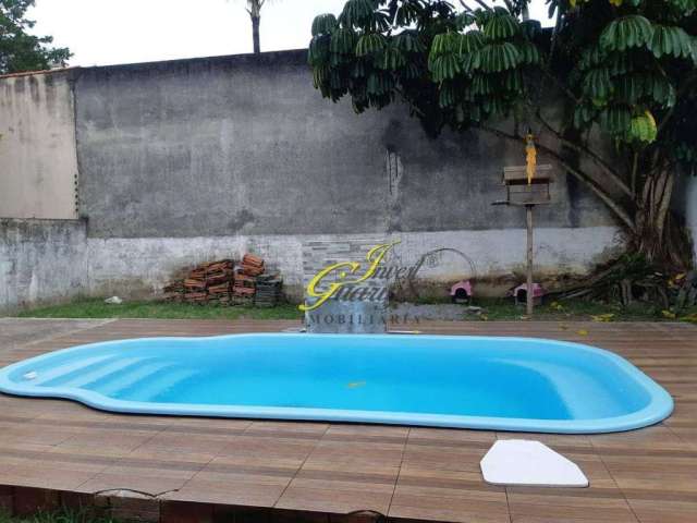 Casa com 4 dormitórios sendo 2 suítes, piscina, próximo a praia, 4 vagas de garagem na Praia da Enseada no Guarujá/SP