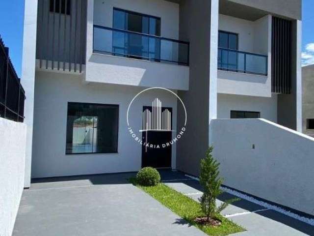 Sobrado com 3 dormitórios à venda, 107 m² por R$ 550.000 - Real Parque - São José/SC