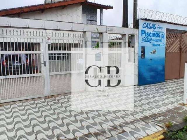 Casa com edícula