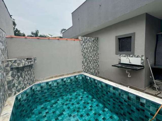 Casa com piscina 2 dormitórios