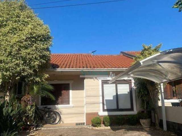 Casa com 3 dormitórios à venda, 78 m² por R$ 550.000,00 - Central Park - Cachoeirinha/RS