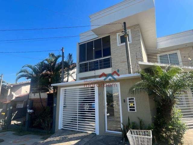 Casa com 3 dormitórios à venda, 132 m² por R$ 700.000,00 - Moinhos de Vento - Canoas/RS