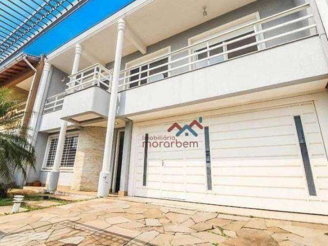 Casa com 4 dormitórios à venda, 298 m² por R$ 1.450.000,00 - Moinhos de Vento - Canoas/RS