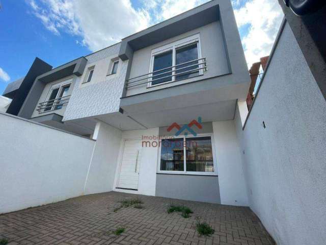 Casa com 3 dormitórios à venda, 130 m² por R$ 690.000,00 - Estância Velha - Canoas/RS