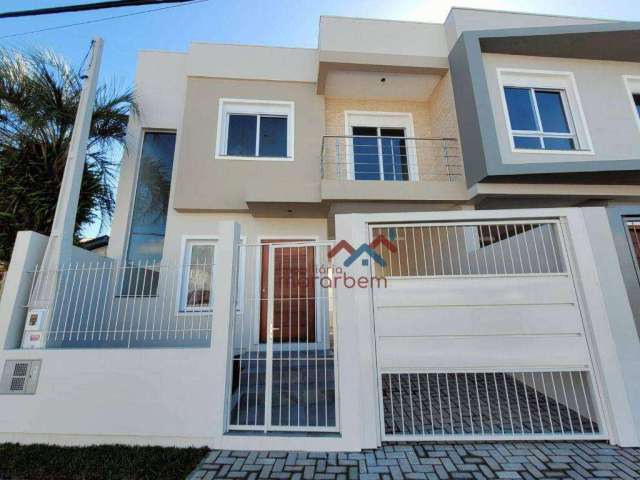 Casa com 3 dormitórios à venda, 122 m² por R$ 620.000,00 - Nossa Senhora das Graças - Canoas/RS