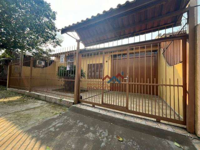 Casa com 2 dormitórios à venda, 103 m² por R$ 330.000,00 - Guajuviras - Canoas/RS