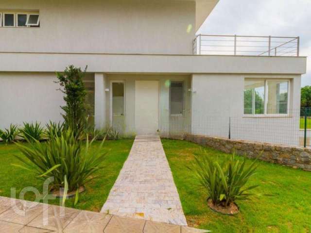 Casa à venda em Cacupé com 946 m², 4 quartos, 1 su