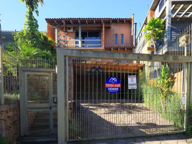 Casa com 3 quartos à venda na Rua Edgar Luiz Schneider, 490, Jardim Isabel, Porto Alegre por R$ 1.290.000