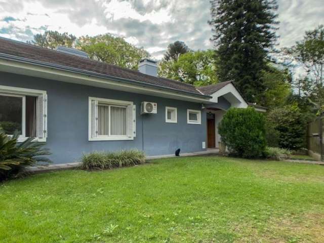 Casa com 4 quartos à venda na Rua Conselheiro Xavier da Costa, 1941, Jardim Isabel, Porto Alegre por R$ 1.750.000