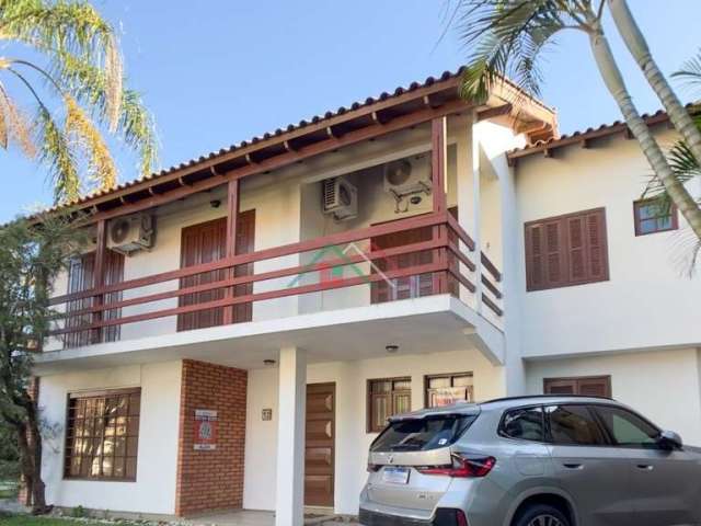 Casa em condomínio fechado com 3 quartos à venda na Rua Conrado Ferrari, 71, Jardim Isabel, Porto Alegre por R$ 800.000