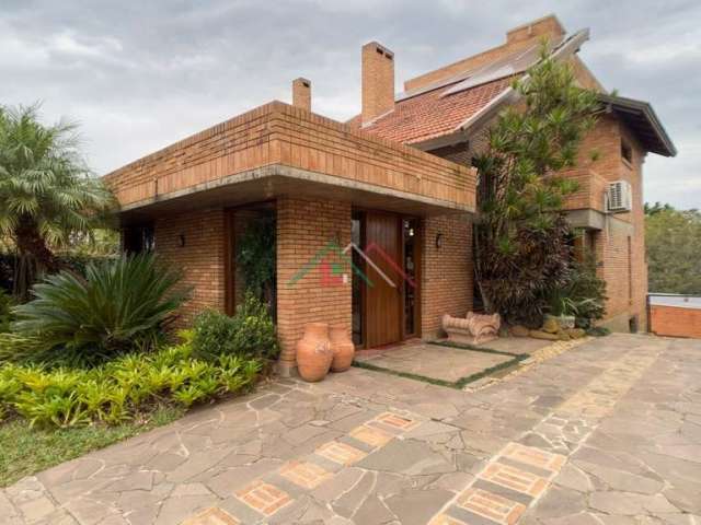 Casa em condomínio fechado com 4 quartos à venda na Avenida Jacuí, 767, Cristal, Porto Alegre por R$ 1.900.000