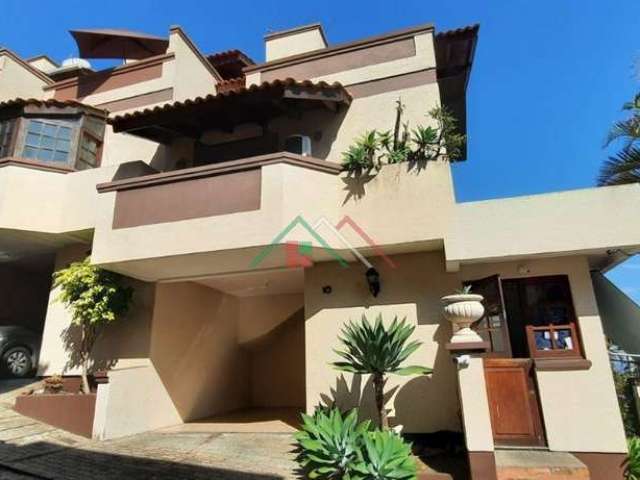 Casa em condomínio fechado com 3 quartos à venda na Avenida Wenceslau Escobar, 3714, Tristeza, Porto Alegre por R$ 590.000