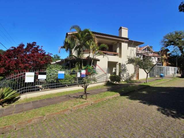 Casa com 3 quartos à venda na Rua Edgar Luiz Schneider, 165, Jardim Isabel, Porto Alegre por R$ 750.000