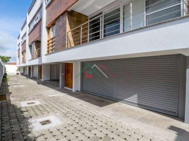 Casa em condomínio fechado com 3 quartos à venda na Avenida Pereira Passos, 795, Vila Assunção, Porto Alegre por R$ 1.300.000