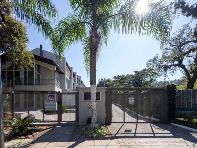 Casa em condomínio fechado com 3 quartos à venda na Avenida Coronel Marcos, 240, Pedra Redonda, Porto Alegre por R$ 954.000