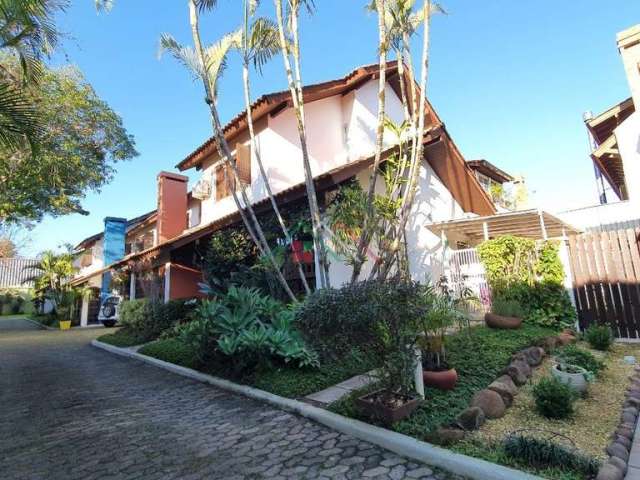 Casa em condomínio fechado com 3 quartos à venda na Rua Manoel Leão, 95, Pedra Redonda, Porto Alegre por R$ 1.300.000