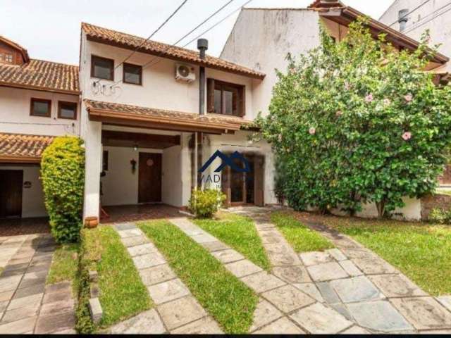 Casa em condomínio fechado com 3 quartos à venda na Avenida Eduardo Prado, 695, Cavalhada, Porto Alegre por R$ 570.000