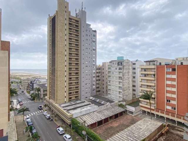 2 dormitórios a 100m da praia, sacada com vista para o mar e vaga de garagem.