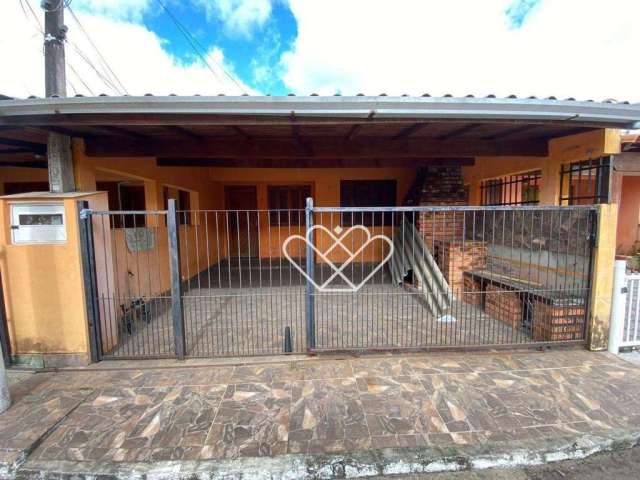 Seu Novo Lar: Charmosa Casa com Quintal e Churrasqueira no Bairro Santa Cruz