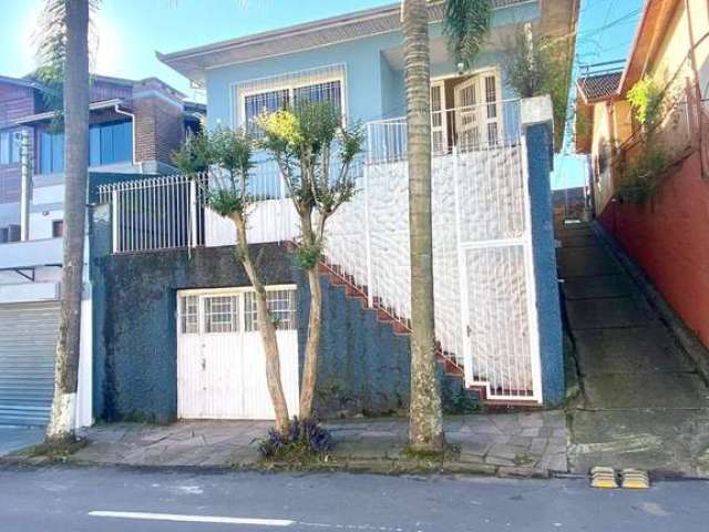 Casa com 3 quartos à venda no Rio Branco, Caxias do Sul  por R$ 500.000