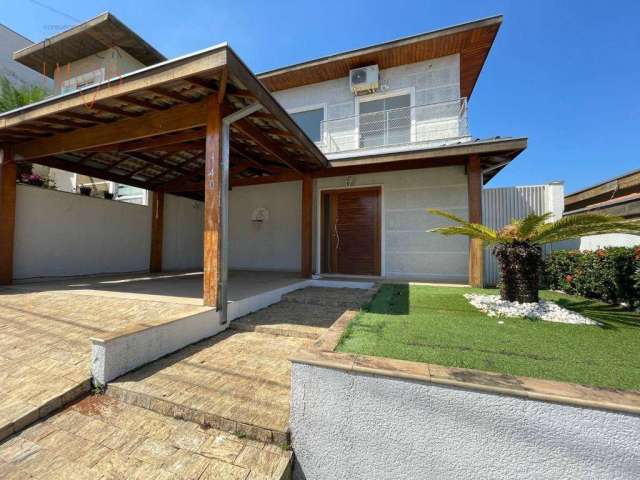 Casa com 4 dormitórios à venda, 181 m² por R$ 890.000,00 - Condomínio Hípica Pinheiro - Taubaté/SP