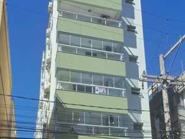 1 dormitório amplo no centro, churrasqueira, andar alto, elevador