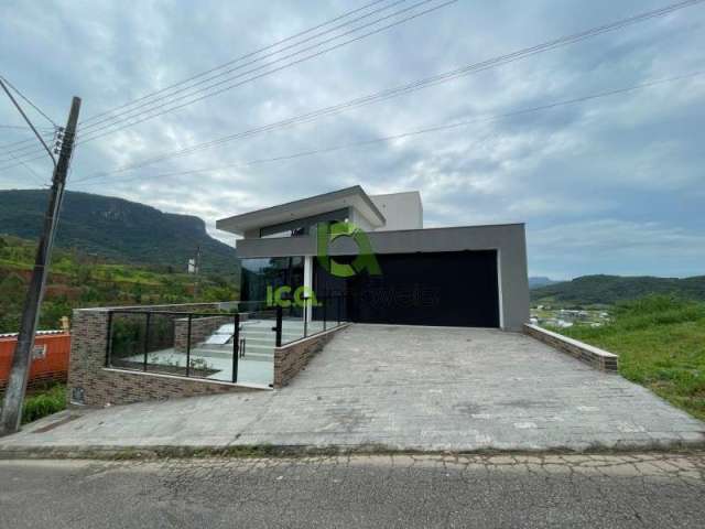 Casa alto padrão, com 3 quartos sendo 3 Suítes e Piscina borda infinita na Pedra Branca, Palhoça - SC, Próximo à Unisul.