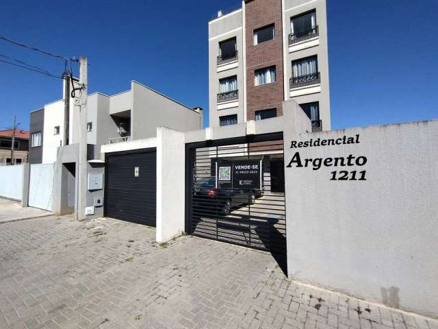 Apartamento para alugar em São José dos Pinhais, possui cozinha planejada e sacada com churrasqueir