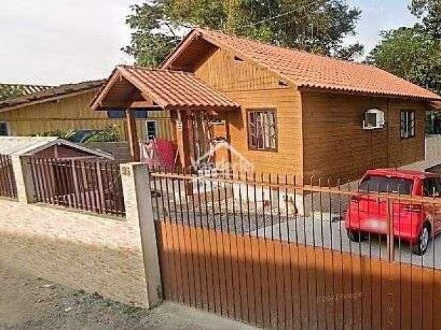 Casa mista com 02 quartos, área de lazer e garagem coberta no bairro Guarda do Cubatão em Palhoça - SC