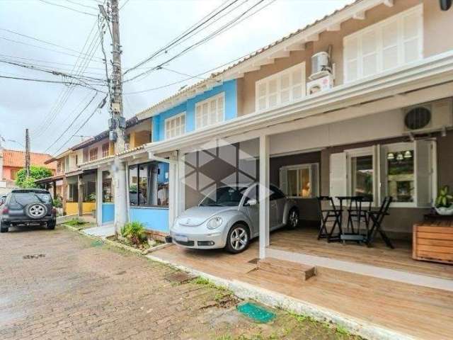 Casa em condomínio fechado com 3 quartos à venda na Avenida Juca Batista, 1490, Cavalhada, Porto Alegre por R$ 550.000