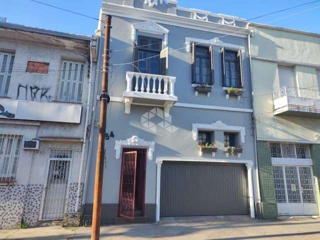 Casa com 3 quartos à venda na Rua Gaspar Martins, 454, Floresta, Porto Alegre por R$ 980.000