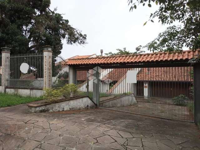 Casa com 4 quartos à venda na Avenida Arlindo Pasqualini, 765, Jardim Isabel, Porto Alegre por R$ 1.290.000