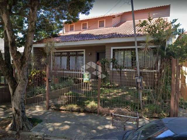 Casa com 4 quartos à venda na Rua Gustavo Schmidt, 305, Três Figueiras, Porto Alegre por R$ 1.740.000