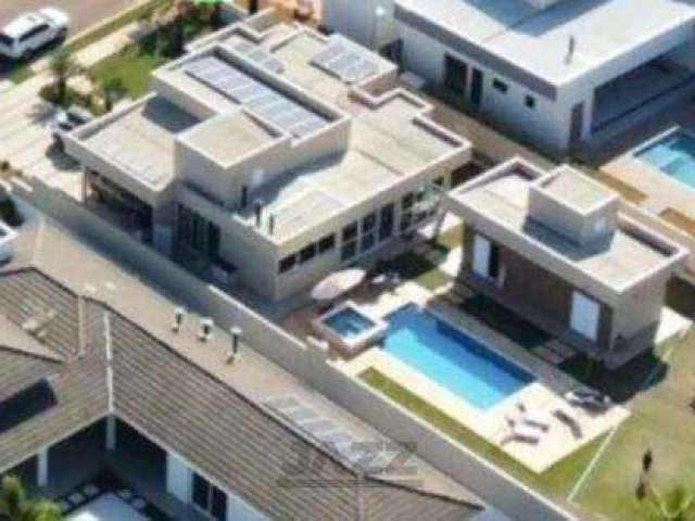 Chácara à venda no condomínio Portal dos Lagos, Boituva – SP. Possui 5 suítes, sala, cozinha, área gourmet, piscina e 7 vagas na garagem.