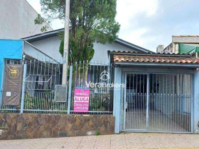 Casa com 3 dormitórios para alugar, 220 m² por R$ 4.660,00/mês - Centro - Gravataí/RS